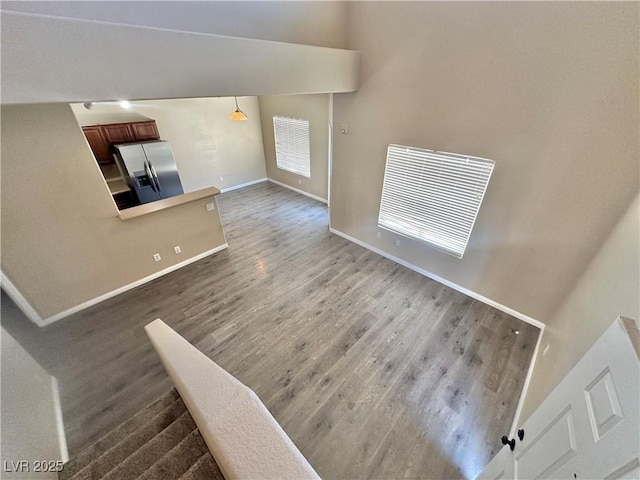 10455 Alpine Edge Ave, Las Vegas, NV 89129 - stairway featuring baseboards and wood finished floors