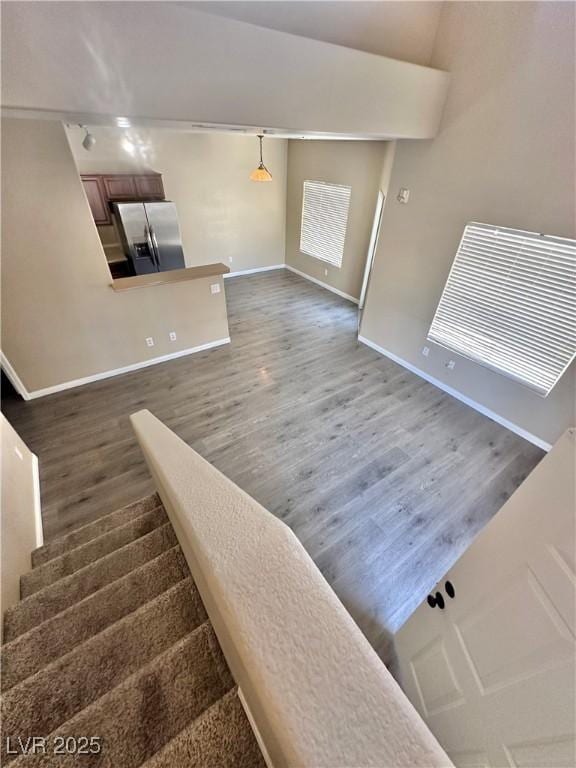 10455 Alpine Edge Ave, Las Vegas, NV 89129 - stairway with wood finished floors and baseboards