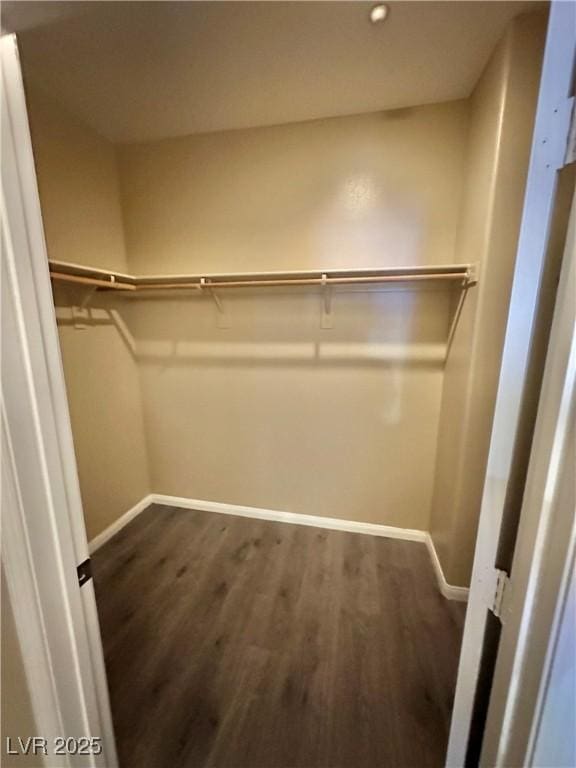 10455 Alpine Edge Ave, Las Vegas, NV 89129 - spacious closet featuring dark wood-style flooring