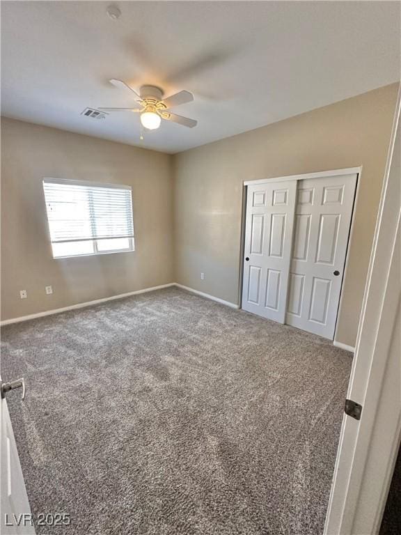 10455 Alpine Edge Ave, Las Vegas, NV 89129 - unfurnished bedroom with carpet flooring, baseboards, a closet, and a ceiling fan