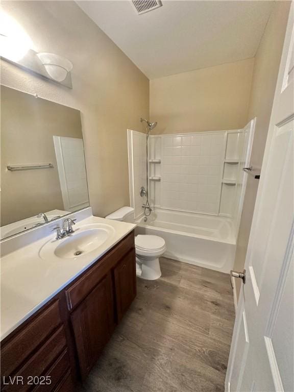 10455 Alpine Edge Ave, Las Vegas, NV 89129 - bathroom with vanity, wood finished floors, bathing tub / shower combination, and toilet
