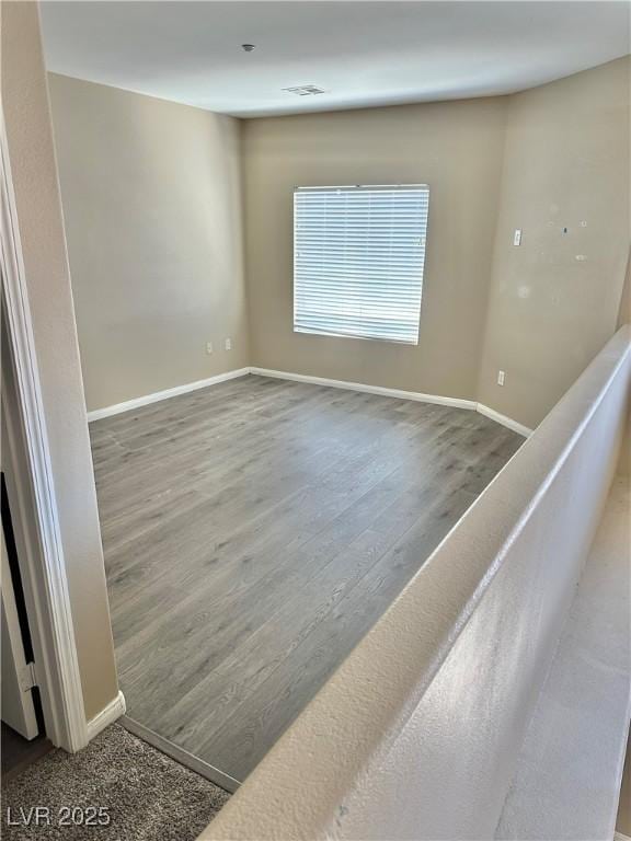 10455 Alpine Edge Ave, Las Vegas, NV 89129 - empty room with wood finished floors and baseboards