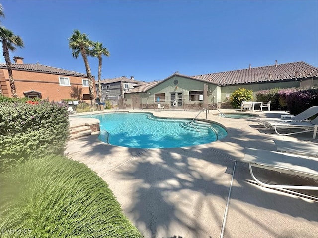 10455 Alpine Edge Ave, Las Vegas, NV 89129 - community pool featuring a patio and a community hot tub