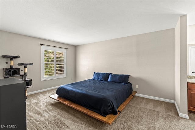 2606 S Durango Dr Unit 245, Las Vegas, NV 89117 - bedroom with light carpet and baseboards