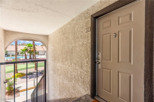 2606 S Durango Dr Unit 245, Las Vegas, NV 89117 - entrance to property with stucco siding and a balcony