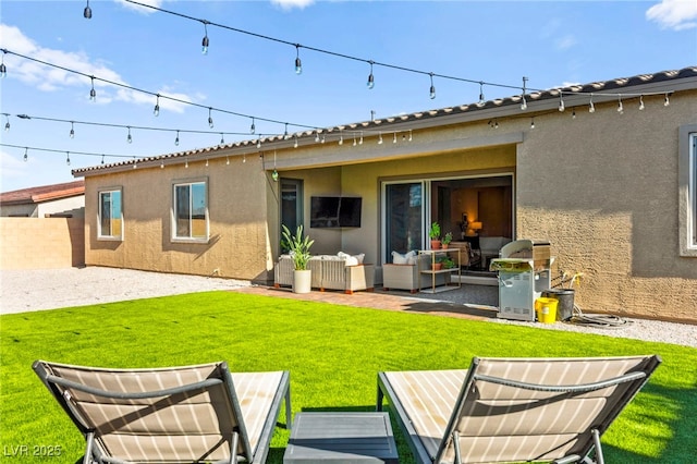 10906 Mila Landing Ave, Las Vegas, NV 89166 - back of property featuring stucco siding, an outdoor living space, and a patio