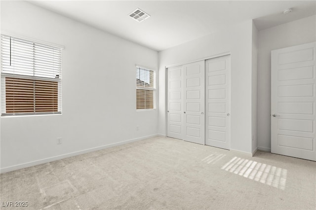 10906 Mila Landing Ave, Las Vegas, NV 89166 - unfurnished bedroom featuring carpet floors, baseboards, and a closet