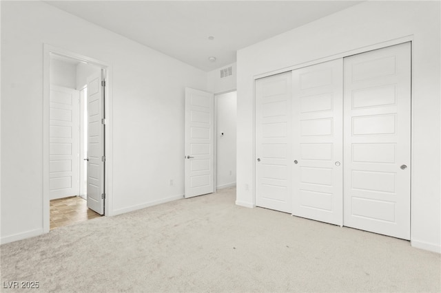 10906 Mila Landing Ave, Las Vegas, NV 89166 - unfurnished bedroom featuring carpet floors, baseboards, and a closet