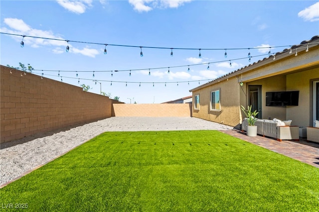 10906 Mila Landing Ave, Las Vegas, NV 89166 - view of yard featuring a patio and an outdoor hangout area