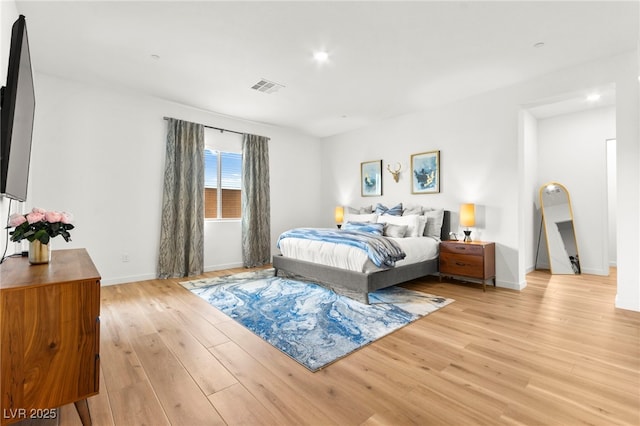 10906 Mila Landing Ave, Las Vegas, NV 89166 - bedroom with light wood-style floors, baseboards, and recessed lighting