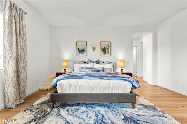 10906 Mila Landing Ave, Las Vegas, NV 89166 - bedroom featuring wood finished floors and baseboards