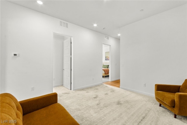 10906 Mila Landing Ave, Las Vegas, NV 89166 - sitting room featuring light carpet, recessed lighting, and baseboards