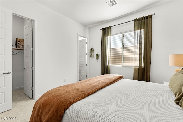 10906 Mila Landing Ave, Las Vegas, NV 89166 - bedroom with a spacious closet, light colored carpet, and a closet