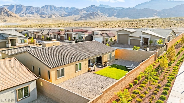 10906 Mila Landing Ave, Las Vegas, NV 89166 - aerial view of residential area with a mountain backdrop