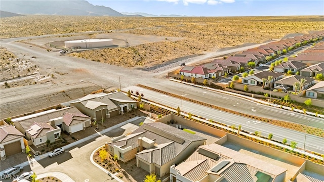 10906 Mila Landing Ave, Las Vegas, NV 89166 - aerial perspective of suburban area featuring a mountainous background and a desert landscape