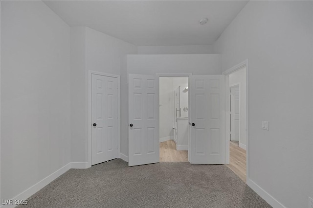 10113 Plomosa Pl, Las Vegas, NV 89134 - unfurnished bedroom featuring carpet floors and baseboards