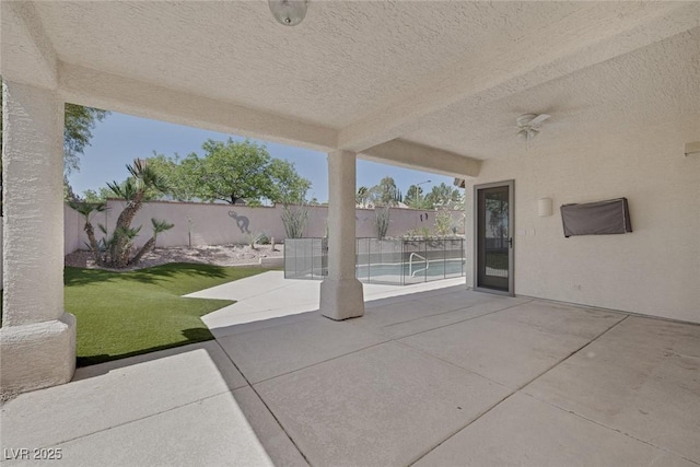 10113 Plomosa Pl, Las Vegas, NV 89134 - fenced backyard with a patio
