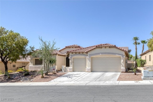 10113 Plomosa Pl, Las Vegas, NV 89134 - mediterranean / spanish-style house with a garage, stucco siding, a tile roof, and concrete driveway