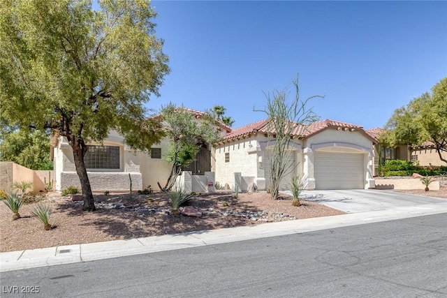 10113 Plomosa Pl, Las Vegas, NV 89134 - view of front facade featuring stucco siding, a garage, driveway, and a tile roof