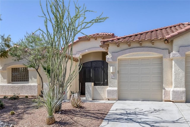 10113 Plomosa Pl, Las Vegas, NV 89134 - mediterranean / spanish-style home with an attached garage, a tiled roof, and stucco siding