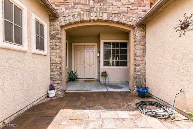 1413 Gentle Brook St, North Las Vegas, NV 89084 - entrance to property with stone siding and stucco siding