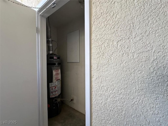 698 S Racetrack Rd Unit 1411, Henderson, NV 89015 - utility room featuring strapped water heater