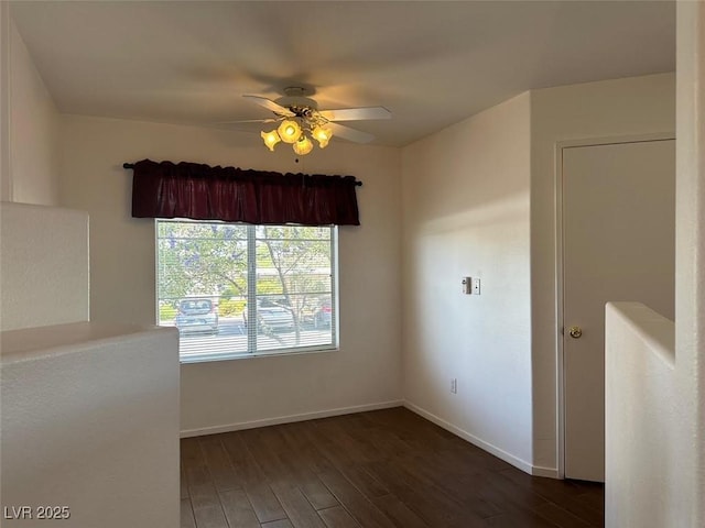 698 S Racetrack Rd Unit 1411, Henderson, NV 89015 - spare room with wood finished floors, baseboards, and a ceiling fan