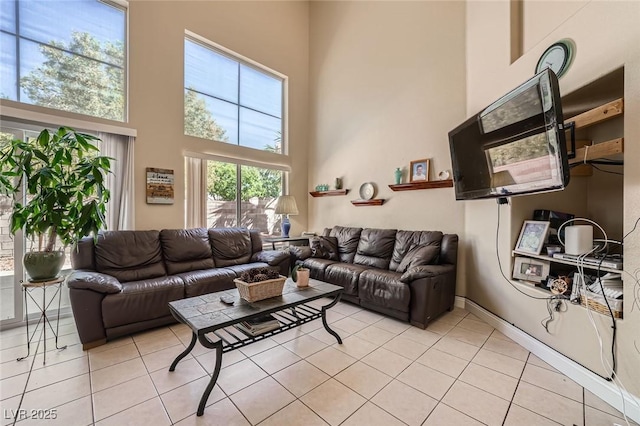 1116 Avellino Ln, Las Vegas, NV 89144 - living room with a towering ceiling and light tile patterned floors