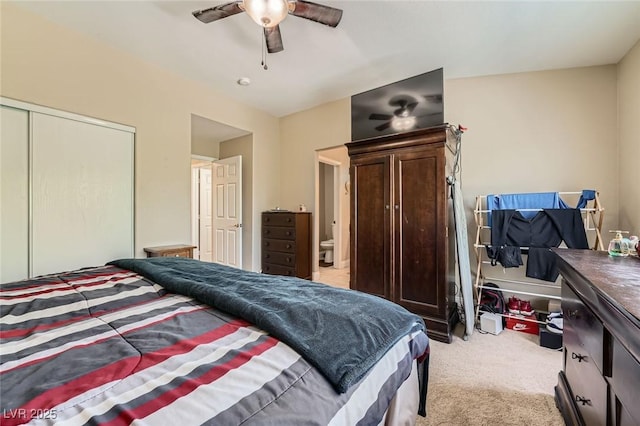 1116 Avellino Ln, Las Vegas, NV 89144 - bedroom with light colored carpet, a closet, and a ceiling fan