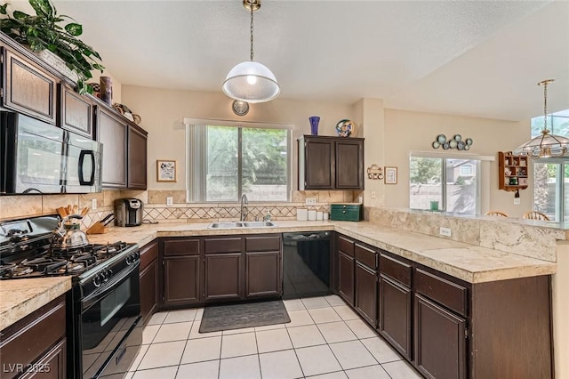 1116 Avellino Ln, Las Vegas, NV 89144 - kitchen with black appliances, a sink, a peninsula, dark brown cabinets, and light countertops