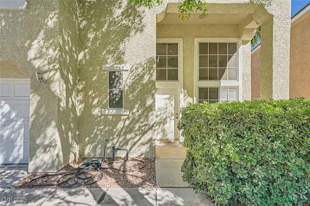 1116 Avellino Ln, Las Vegas, NV 89144 - doorway to property featuring stucco siding