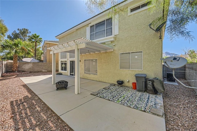 1116 Avellino Ln, Las Vegas, NV 89144 - rear view of property with stucco siding, a patio, a pergola, and a fenced backyard