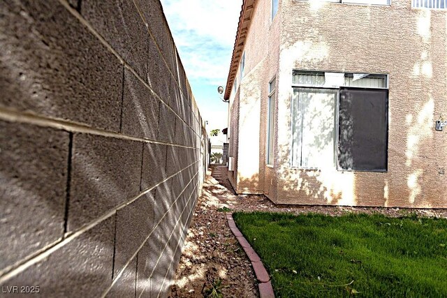1721 Mill Canyon Dr, Las Vegas, NV 89128 - view of home's exterior featuring stucco siding