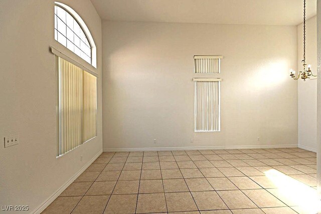 1721 Mill Canyon Dr, Las Vegas, NV 89128 - empty room with light tile patterned flooring and baseboards