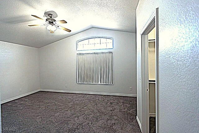 1721 Mill Canyon Dr, Las Vegas, NV 89128 - empty room with lofted ceiling, carpet, a ceiling fan, a textured ceiling, and a textured wall