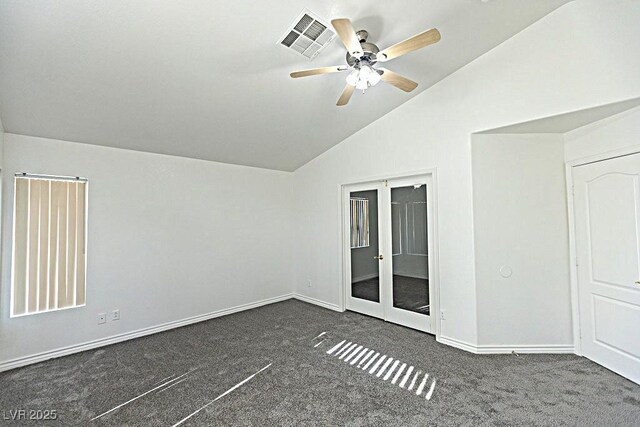 1721 Mill Canyon Dr, Las Vegas, NV 89128 - carpeted empty room with lofted ceiling, ceiling fan, baseboards, and french doors