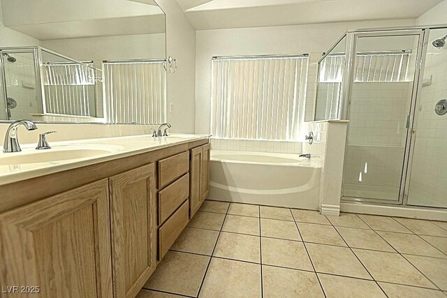 1721 Mill Canyon Dr, Las Vegas, NV 89128 - bathroom featuring tile patterned flooring, a bath, a shower stall, and double vanity