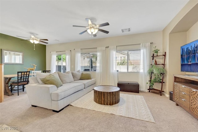 1101 Elation Ln Unit 2, Henderson, NV 89002 - living room with ceiling fan, light carpet, and plenty of natural light