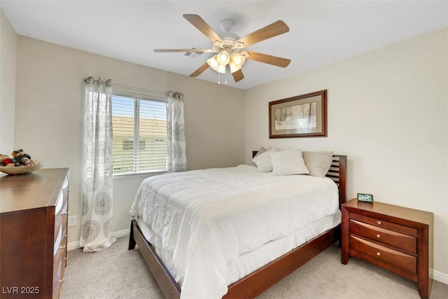 1101 Elation Ln Unit 2, Henderson, NV 89002 - bedroom featuring light colored carpet, baseboards, and ceiling fan