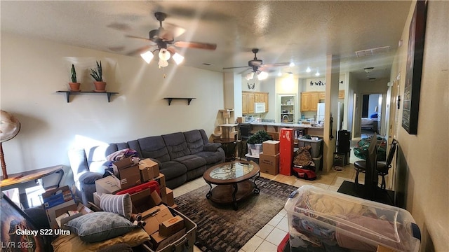 864 Chianti Way, Mesquite, NV 89027 - living room featuring light tile patterned floors and a ceiling fan