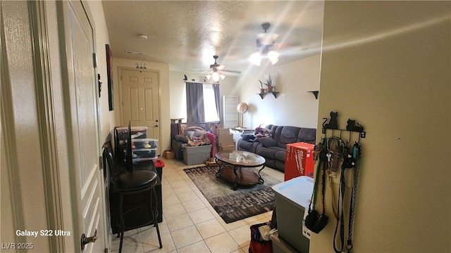 864 Chianti Way, Mesquite, NV 89027 - living area featuring light tile patterned flooring and ceiling fan