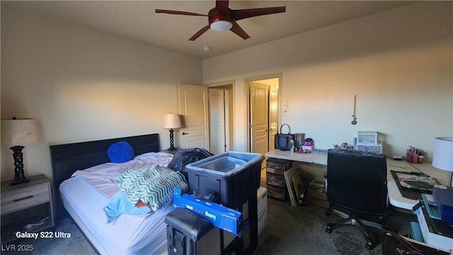 864 Chianti Way, Mesquite, NV 89027 - carpeted bedroom with a desk and a ceiling fan