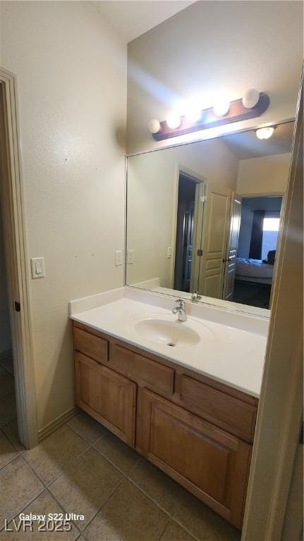 864 Chianti Way, Mesquite, NV 89027 - bathroom with vanity, tile patterned floors, and baseboards