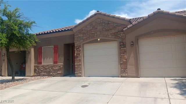 864 Chianti Way, Mesquite, NV 89027 - view of front of house with a tile roof, stone siding, driveway, and stucco siding