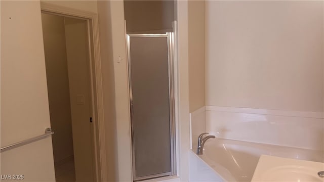 864 Chianti Way, Mesquite, NV 89027 - bathroom with a shower stall and a garden tub