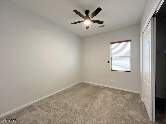 12565 Huckleberry Oak Ave, Las Vegas, NV 89138 - unfurnished bedroom with carpet, baseboards, a closet, and a ceiling fan