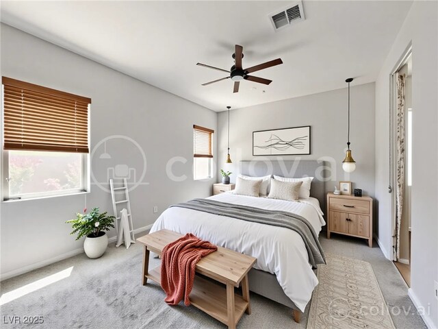 12565 Huckleberry Oak Ave, Las Vegas, NV 89138 - bedroom with light carpet, baseboards, and a ceiling fan