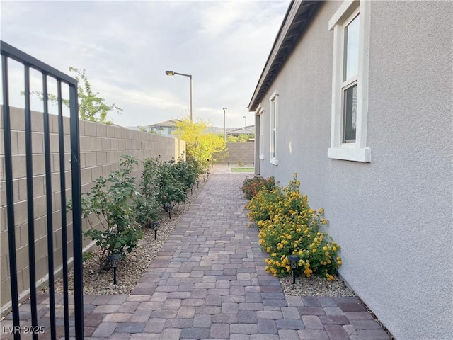 12565 Huckleberry Oak Ave, Las Vegas, NV 89138 - fenced backyard featuring a patio area