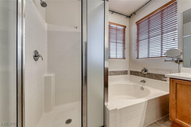 4044 Villeroy Ave, Las Vegas, NV 89141 - bathroom with a stall shower, vanity, and a bath