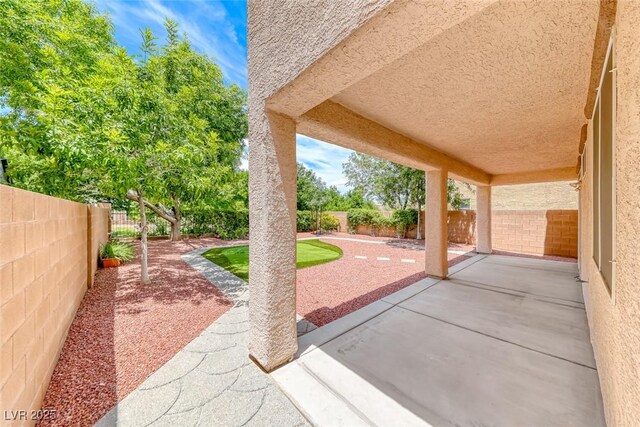 4044 Villeroy Ave, Las Vegas, NV 89141 - fenced backyard featuring a patio